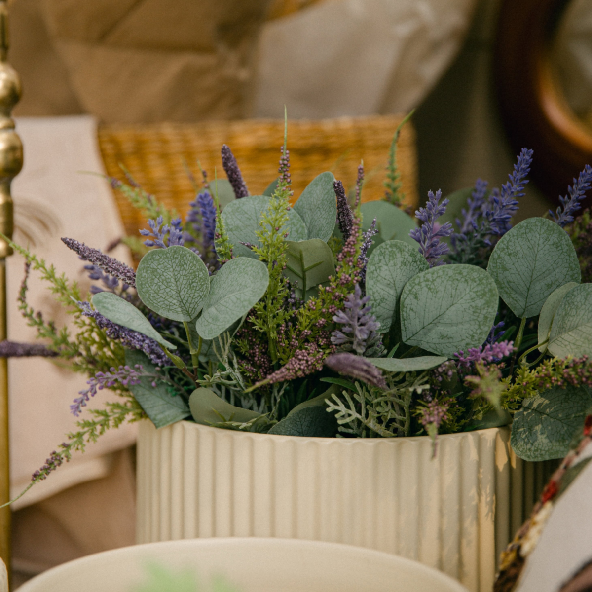 Faux eucalyptus and lavender in a white ribbed out