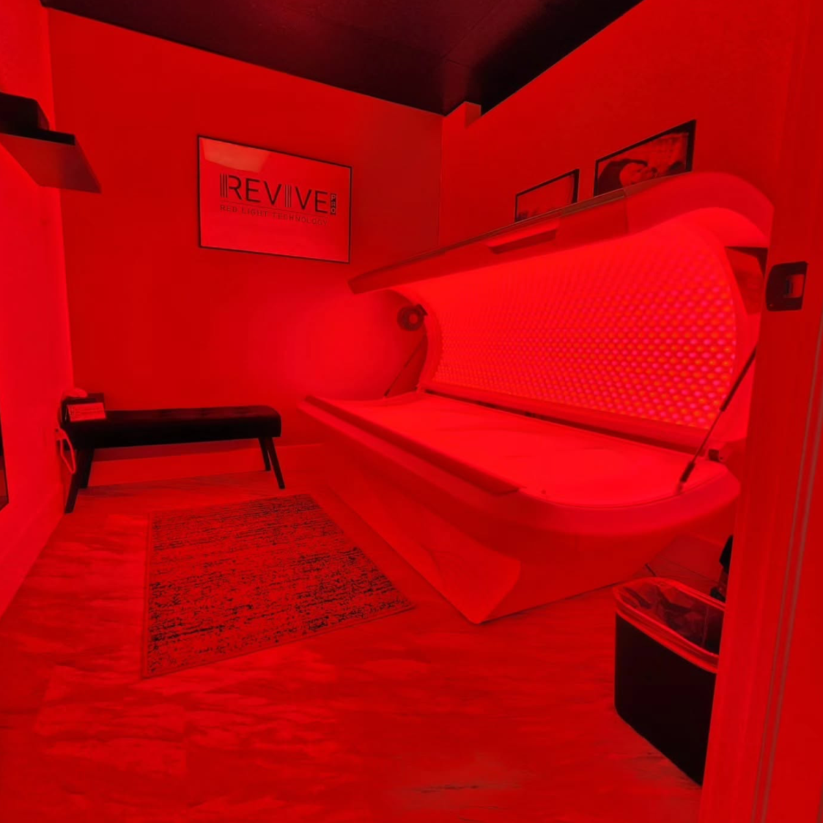 Red Light Therapy Bed with the room lit up red