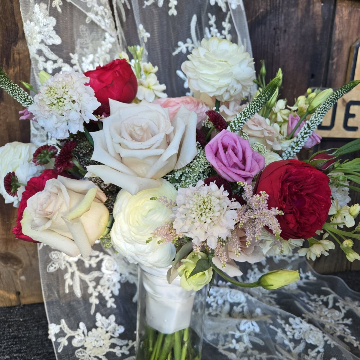 Romantic bouquet of white, red and pink roses