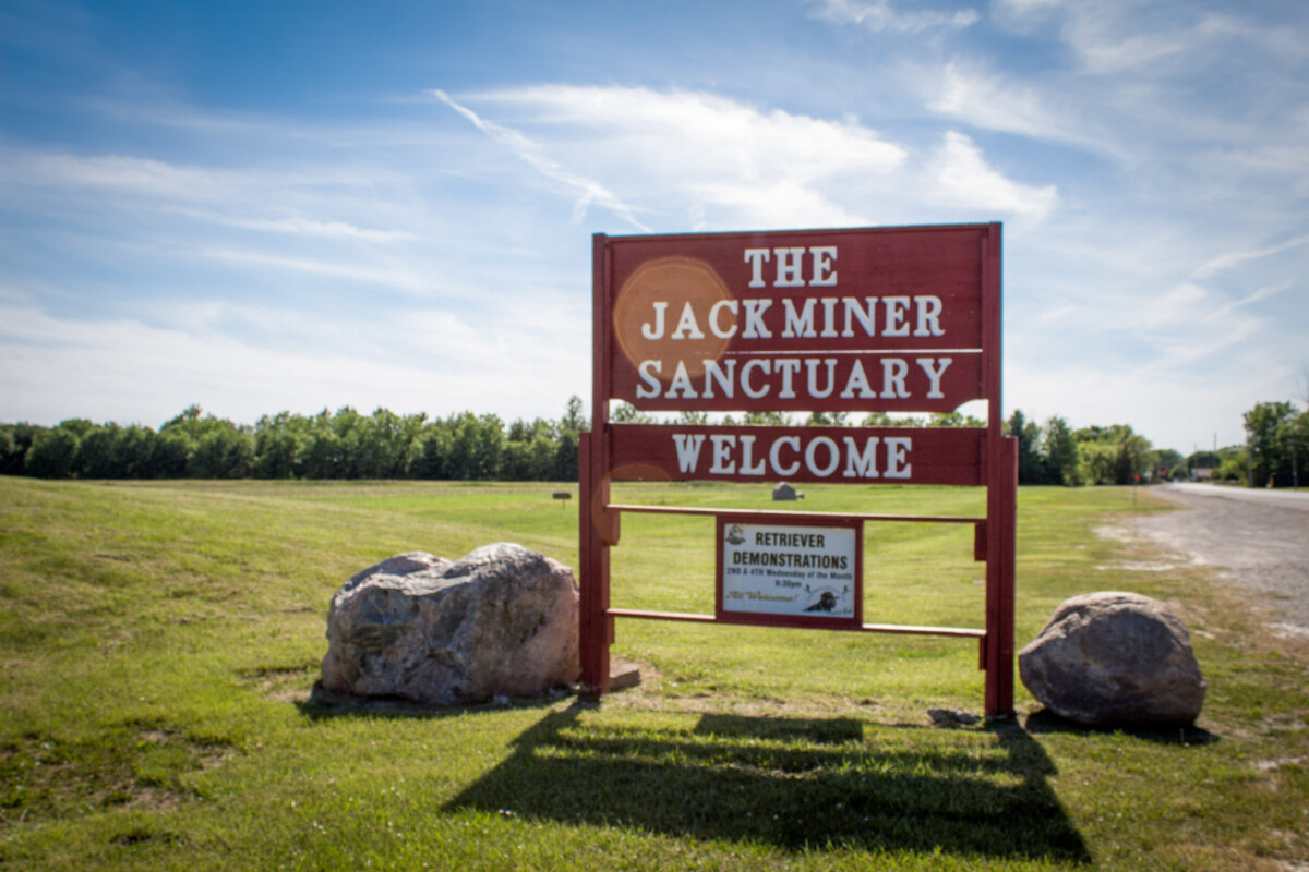Sign welcomes people to Jack Miner Bird Sancturay