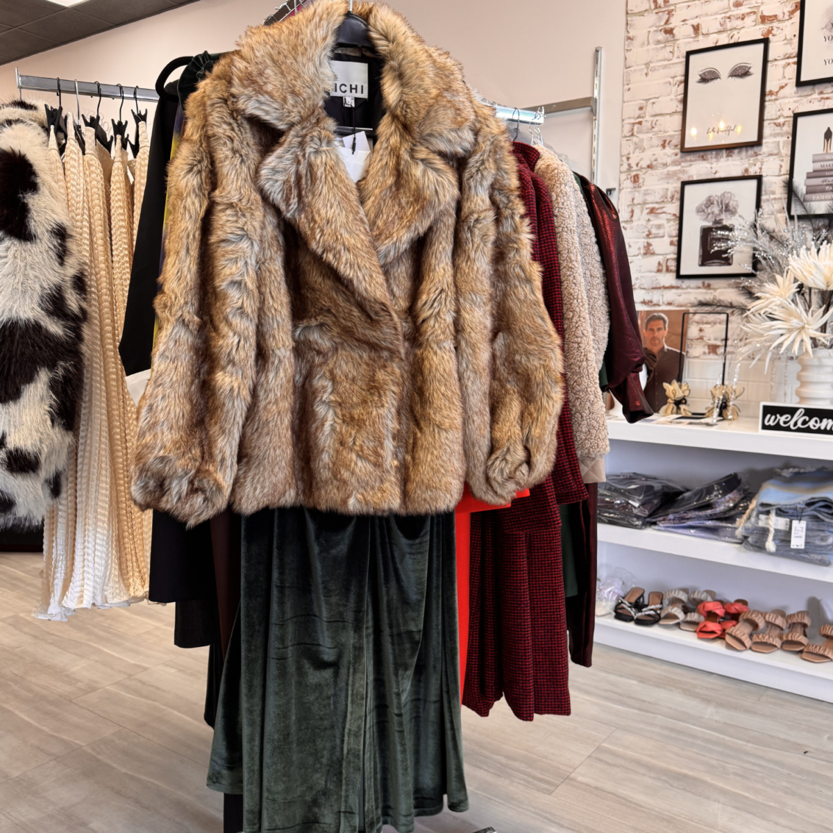 Fur Coat over formal dress on display in store