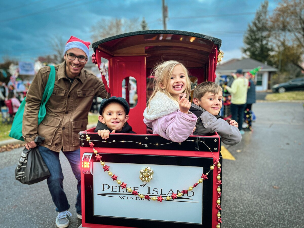 Parade goers are dressed festively ready for the parade to begin.